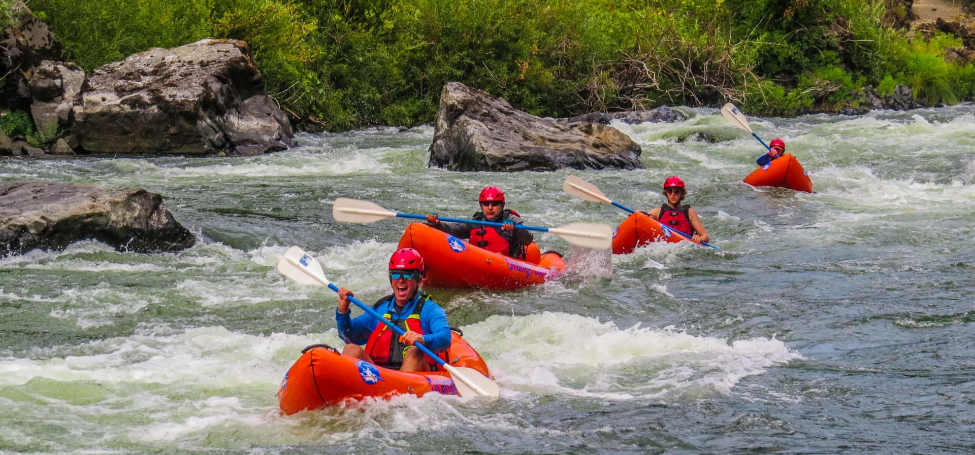 Group kayaking on the rogue river